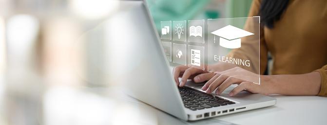 istock image - person typing on a laptop